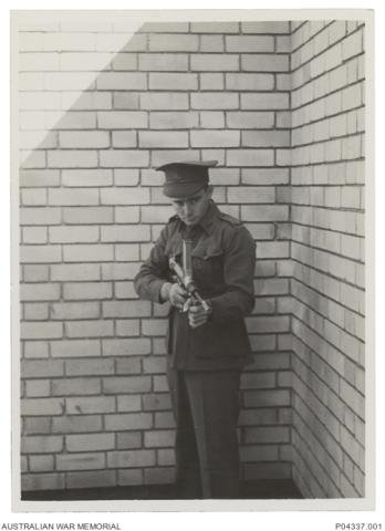 Evelyn Owen with an Owen Gun